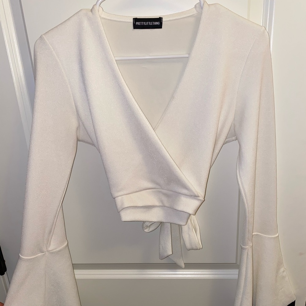 White crop long sleeve with bell sleeves